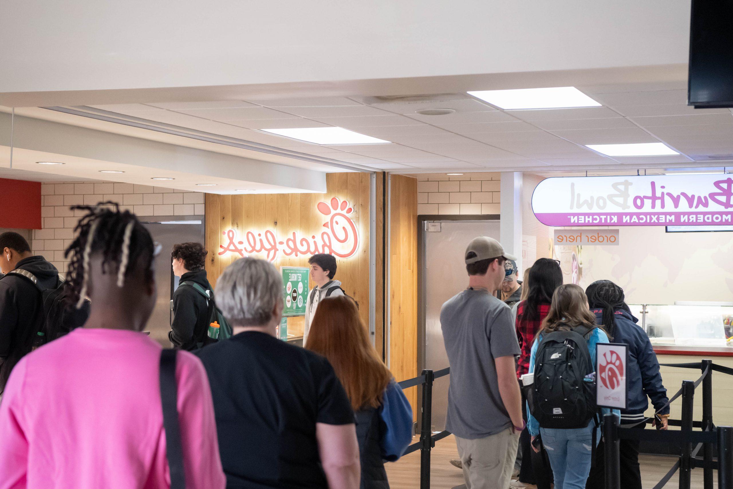 Students standing in line for lunch at the Food Court in the Student Union.